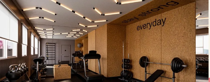Fitness coberto do Inspire Residence, com esteiras e pesos