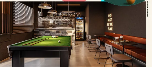 Sport bar do Inspire Residence, com mesa de sinuca e balcão