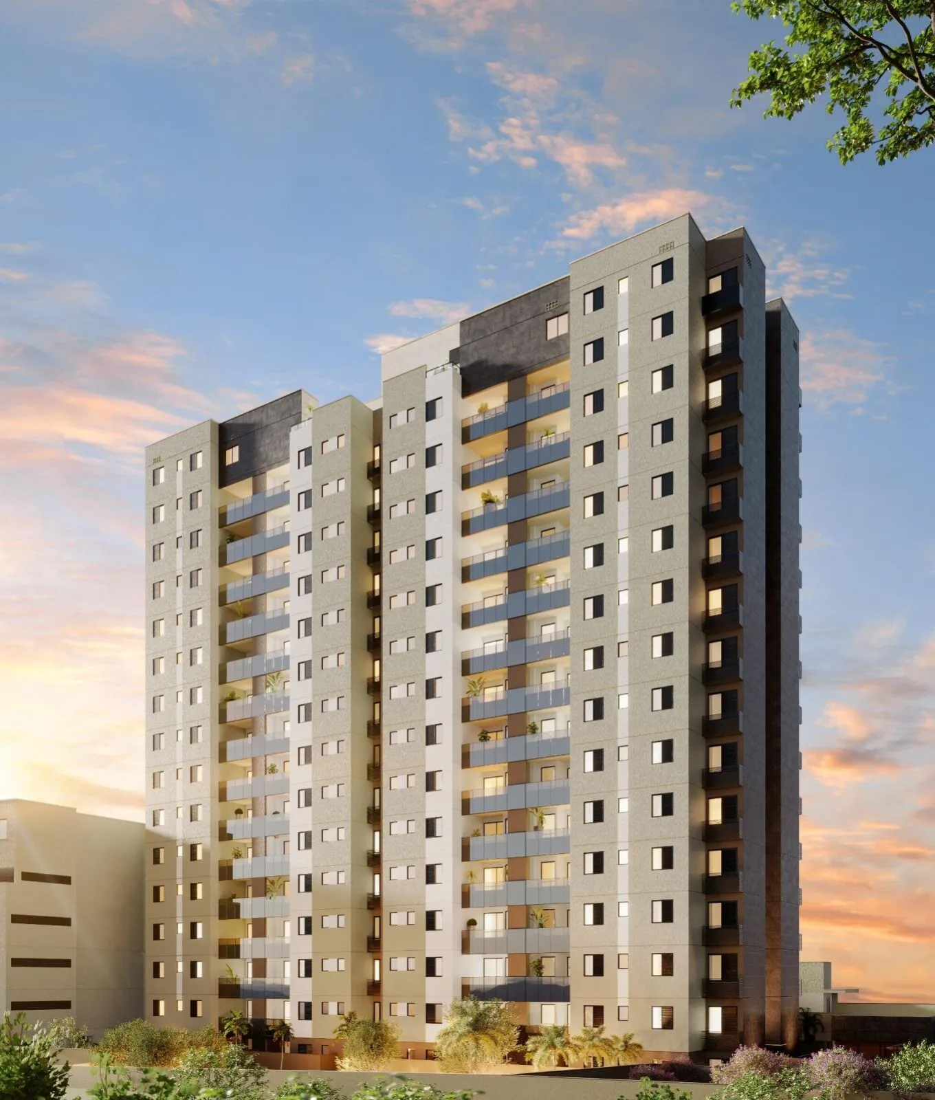 Fachada do Casa Sintra, com a torre residencial ao entardecer